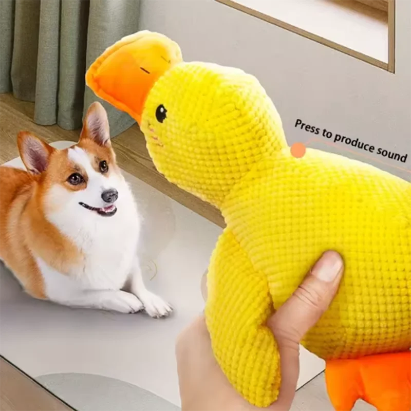 Dog sleeping with a dog hug duck toys to relieve boredom of little yellow duck pet interactive plush doll pet supplies