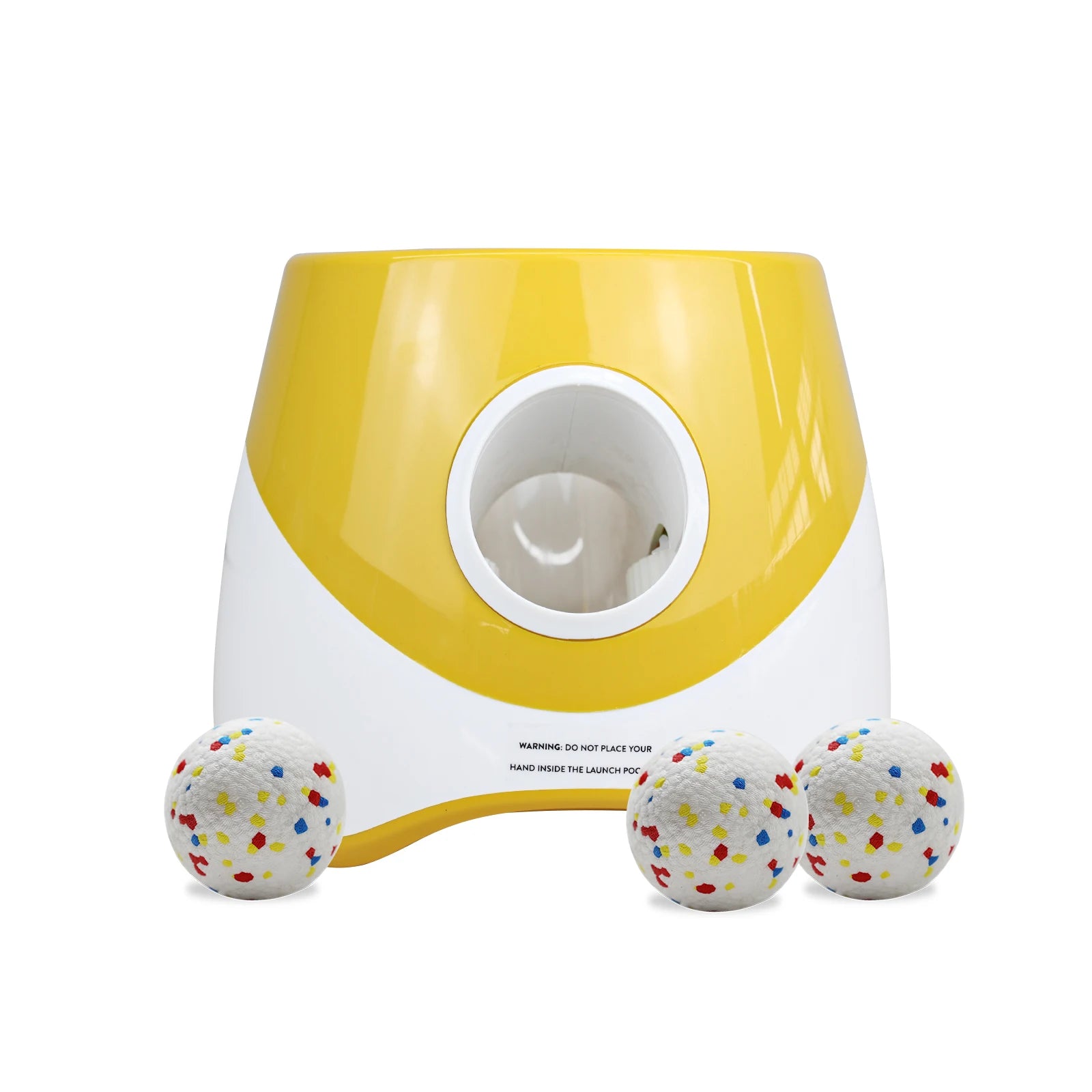 Yellow and white toy for dogs with three colorful balls on a white background

